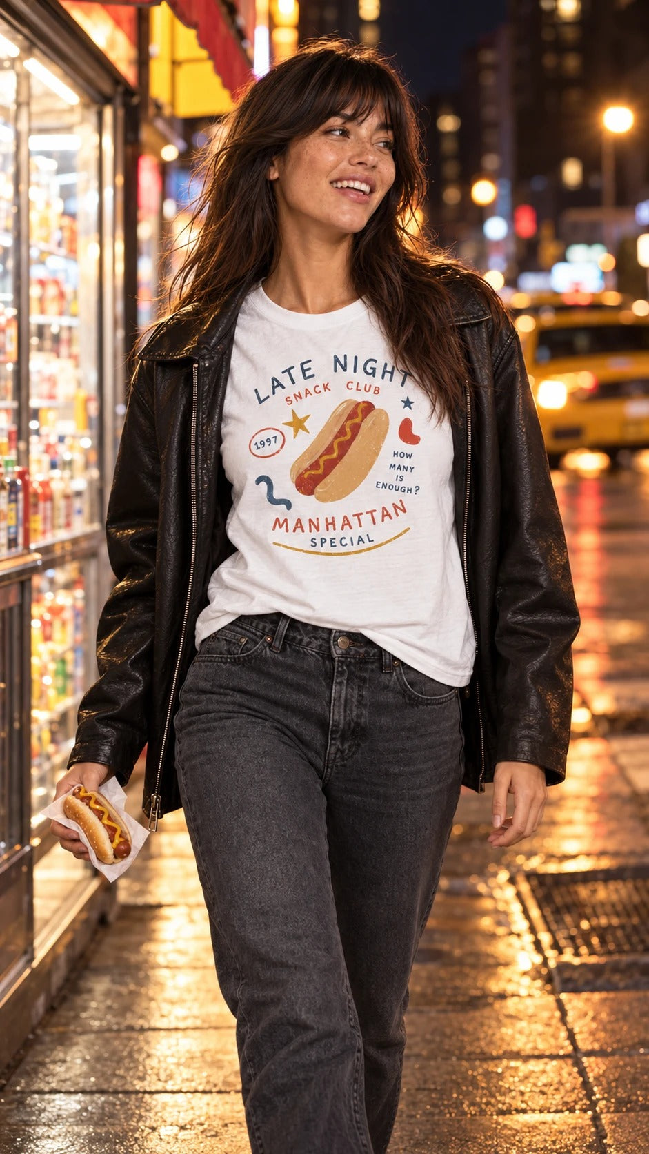 Late Night Manhattan Special hot dog tee with a leather jacket on a rainy city street